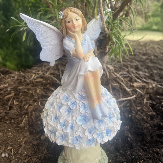 Blue Fairy on a Floral Mushroom Figurine