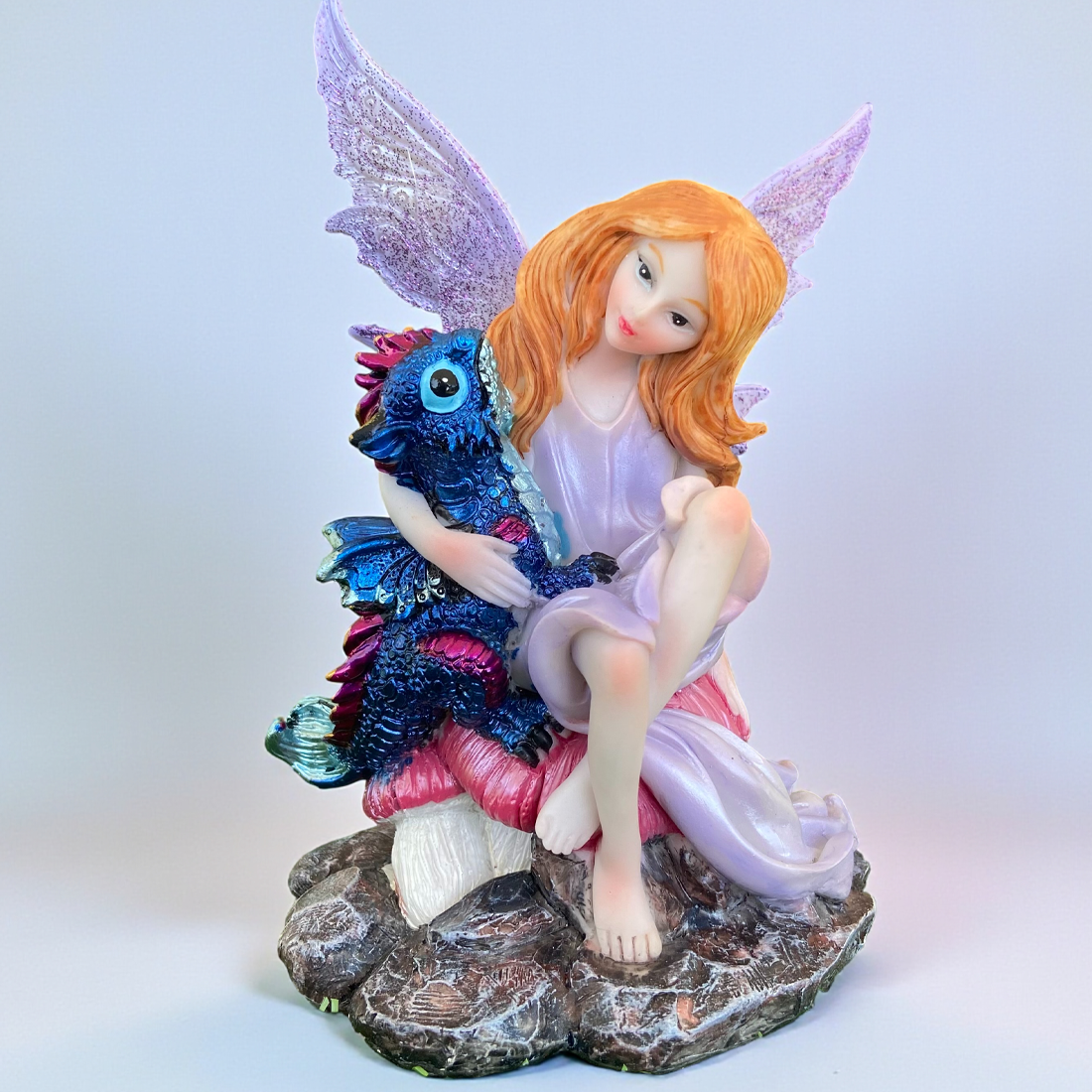 Fairy Figurine With a Dragon