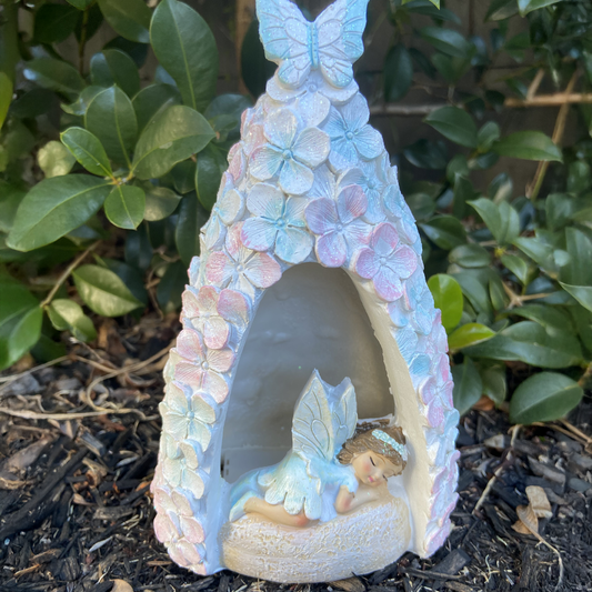 Fairy in a Light Up Pink and Blue Floral Cave