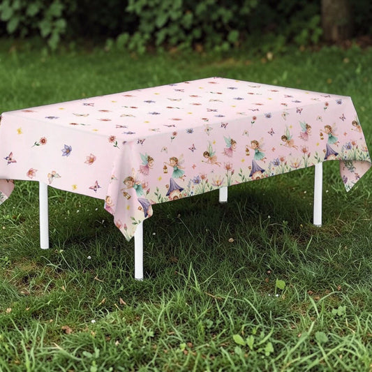 Table with a fairy-themed tablecloth