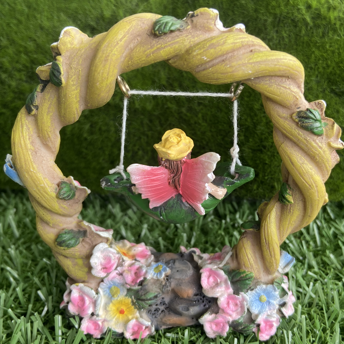 Pink Fairy on a Floral Swing