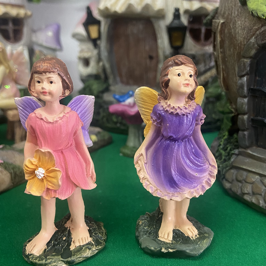 pink or purple fairy figurine 9cm tall