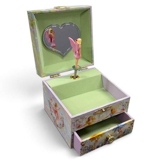 A decorative open music box with a floral pastel exterior, pale green interior lining, a heart-shaped mirror on the inside lid, and a small fairy figurine on a spinning rod. The bottom drawer is pulled open, showing more of the floral pattern.