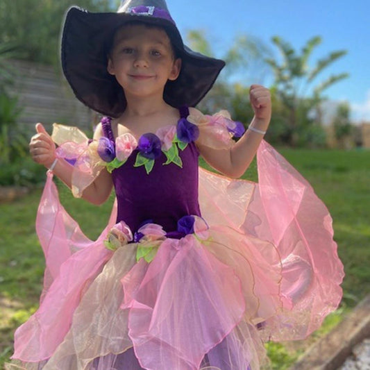 a fairy dress in a divine purple velvet fabric for the bodice and lots of pink organza in the skirt and wings. pink and purple organza flowers edge the bodice and waist wings attach to the arms with elastic