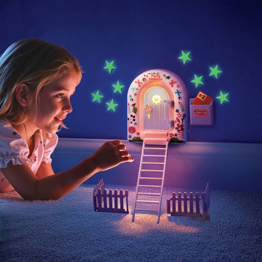 Child looking at a glowing fairy door with stars on a dark blue wall.