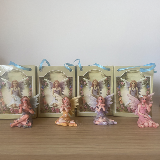 Fairy Figurine Holding a Crystal in a Gift Bag