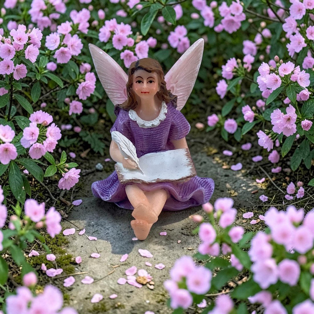 Fairy Figurine Writing in Her Book with Feather Quill