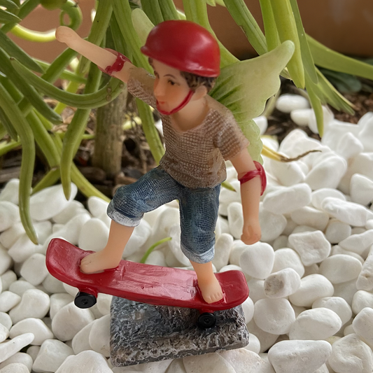 Fairy Noah Riding A Skateboard Figurine