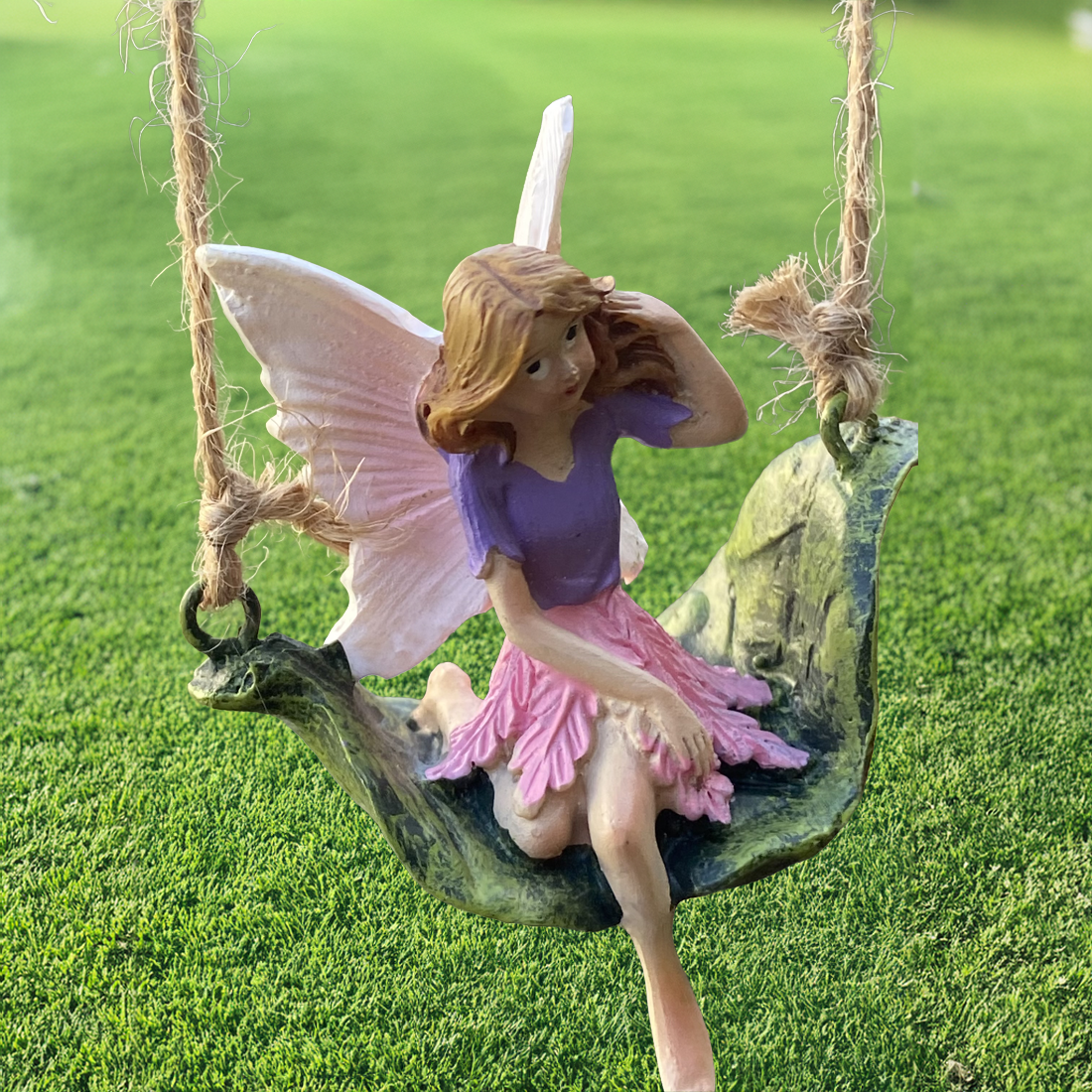 Fairy Swinging on a Leaf