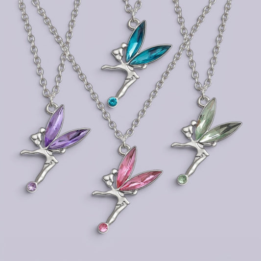 Four silver fairy necklaces with colorful rhinestone wings and small bead accents, arranged on a light lavender background.