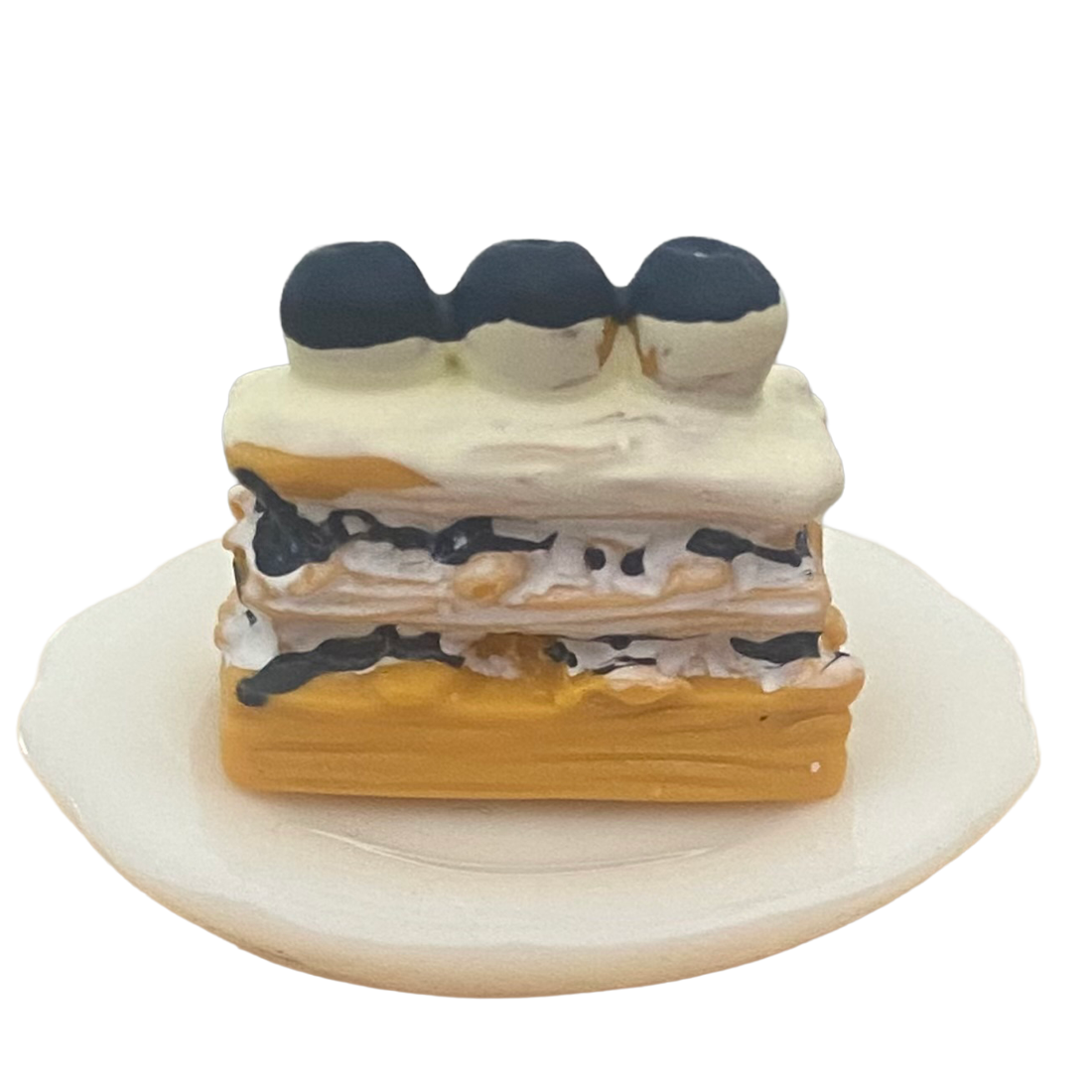 Miniature Slice of Cake on a Plate