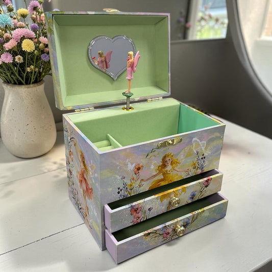 A pastel fairy-themed jewelry box with two drawers, a heart-shaped mirror, and a small fairy figurine,.