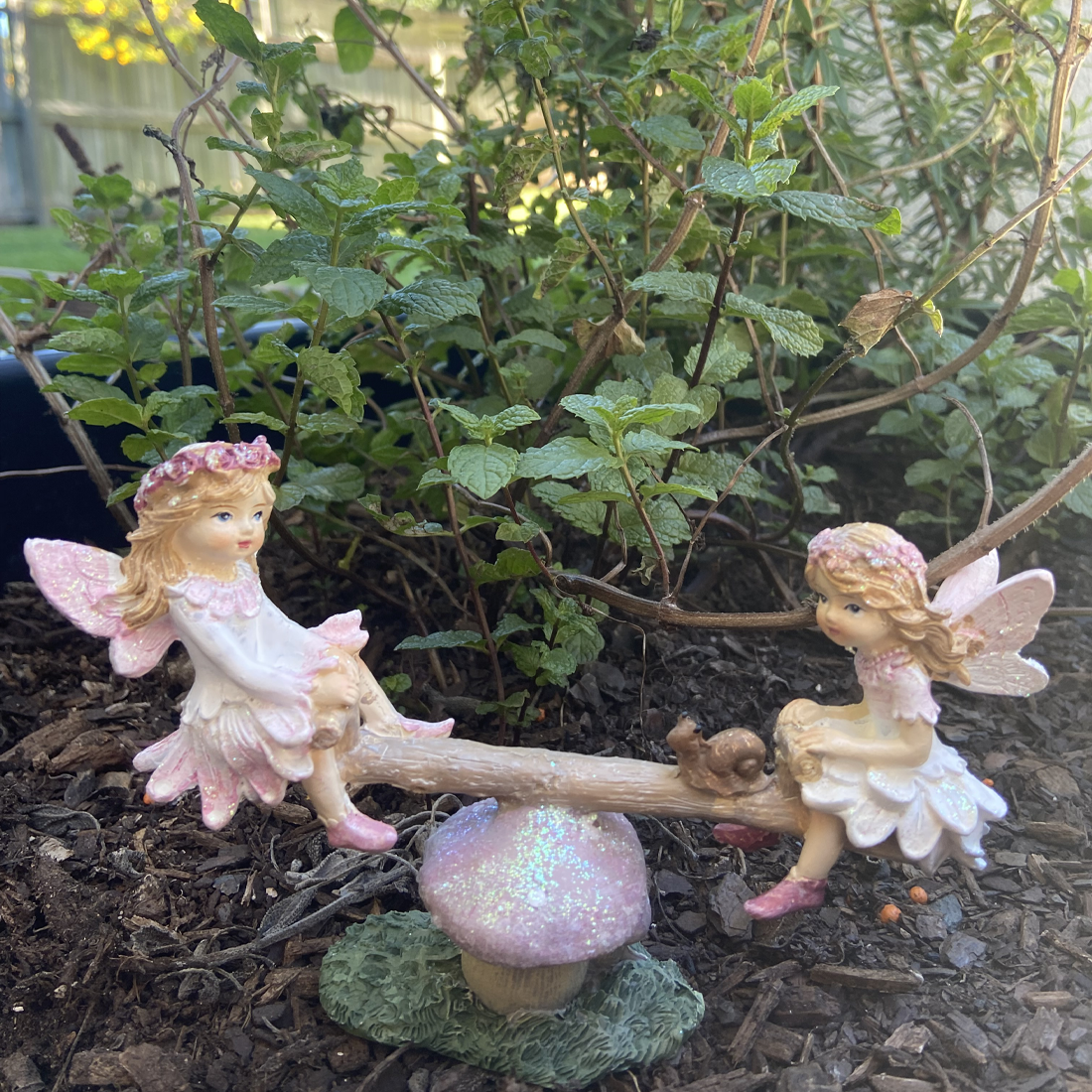 Flower Fairy Friends on a Mushroom Seesaw Figurine